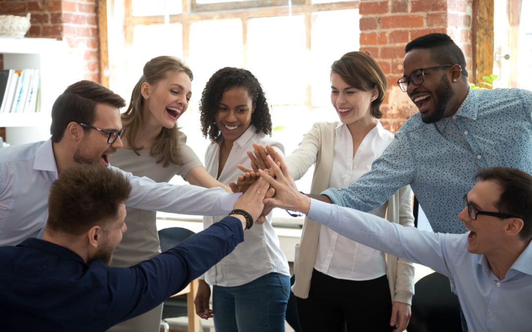 Happy diverse colleagues team people give high five together celebrate great teamwork result motivated by business success victory loyalty unity concept, good corporate relations and teambuilding